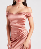 You'll be the best dressed in the Valencia Formal Off-The-Shoulder Wrap Dress as your summer formal dress with unique details from Windsor.