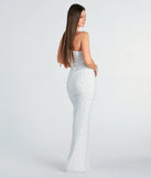 You'll be the best dressed in the Mishka Formal Faux Pearl Mermaid Long Dress as your summer formal dress with unique details from Windsor.