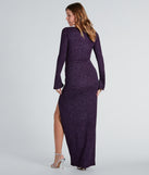 You'll be the best dressed in the Jess Formal Glitter Long Sleeve Slit Dress as your summer formal dress with unique details from Windsor.