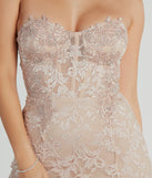 You'll be the best dressed in the Stefani Strapless Corset Lace Mermaid Formal Dress as your summer formal dress with unique details from Windsor.