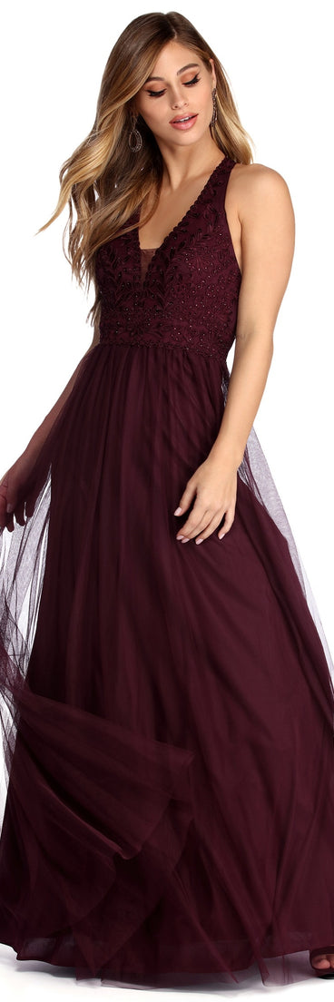 The Alessia Floral Applique Ball Gown is a gorgeous pick as your 2023 prom dress or formal gown for wedding guest, spring bridesmaid, or army ball attire!