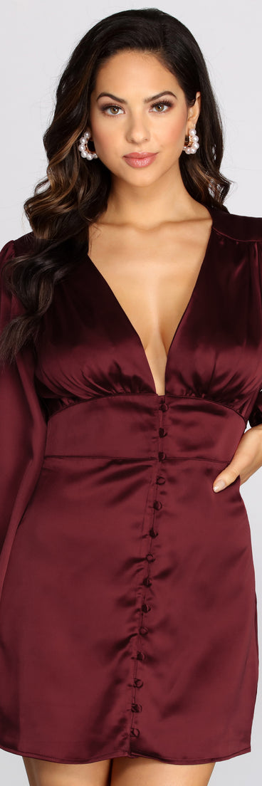 You will feel beautiful in the Satin Satisfaction Button Down Dress as your long dress for any semi-formal or formal holiday party, NYE dress outfit, or pick this stunning style as your gown for any seasonal celebration.