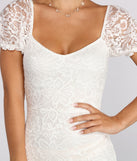 Lovely Lace Mini Dress creates the perfect spring wedding guest dress or cocktail attire with stylish details in the latest trends for 2023!