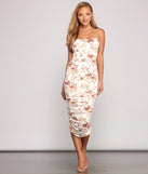 Brunch-Ready Floral Midi Dress creates the perfect spring wedding guest dress or cocktail attire with stylish details in the latest trends for 2023!