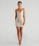 The Ethereal Beauty Iridescent Sequin Mini Dress is a unique party dress to help you create a look for work parties, birthdays, anniversaries, or your next 2023 celebration!