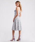 Floral Sunshine Corset Midi Dress creates the perfect summer wedding guest dress or cocktail party dresss with stylish details in the latest trends for 2023!