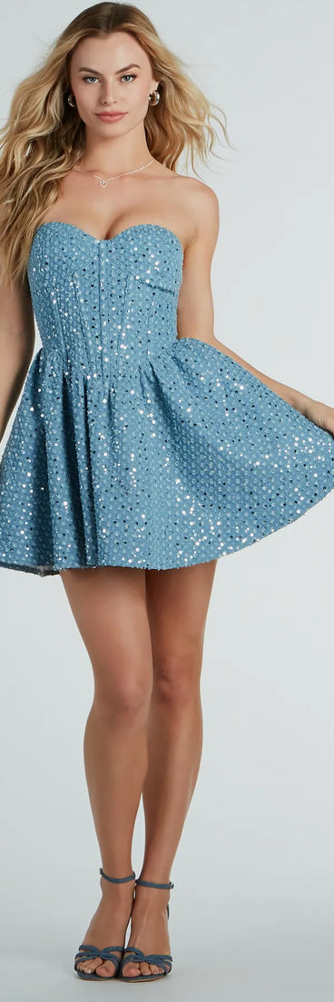 Essential for vacations or summer days, the So Flirty Strapless Sequin Glitter Denim Skater Dress is a sundress or milkmaid dress with sleek and flirty details.