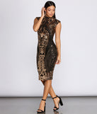 Sequin Diva Midi Dress creates the perfect New Year’s Eve Outfit or new years dress with stylish details in the latest trends to ring in 2023!