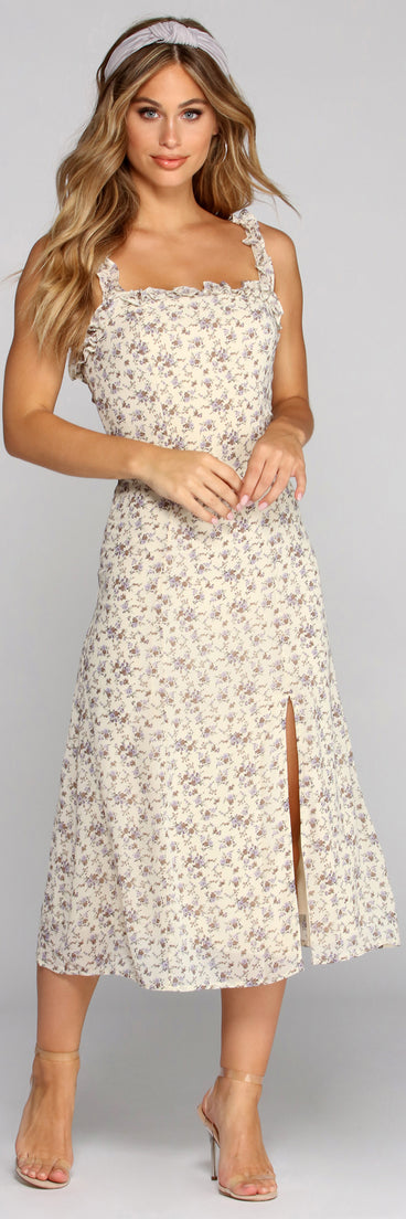 Frilly In Florals Midi Dress creates the perfect spring wedding guest dress or cocktail attire with stylish details in the latest trends for 2023!