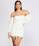 Off Shoulder Puff Sleeve Mini Dress creates the perfect spring wedding guest dress or cocktail attire with stylish details in the latest trends for 2023!