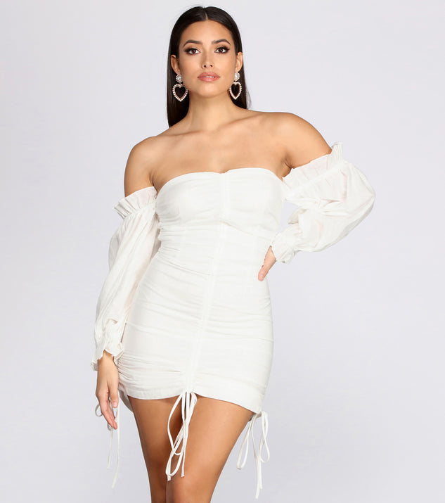 Off Shoulder Puff Sleeve Mini Dress creates the perfect spring wedding guest dress or cocktail attire with stylish details in the latest trends for 2023!