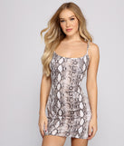 You’ll make a statement in Sultry Style Snake Print Mini Dress as an NYE club dress, a tight dress for holiday parties, sexy clubwear, or a sultry bodycon dress for that fitted silhouette.