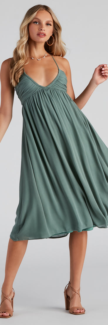 Palisades Ruched V-Neck Midi Dress creates the perfect spring wedding guest dress or cocktail attire with stylish details in the latest trends for 2023!