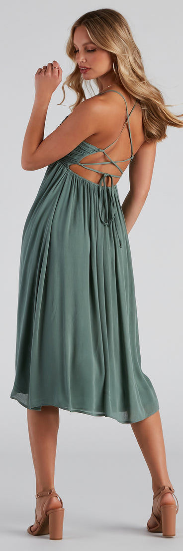 Palisades Ruched V-Neck Midi Dress creates the perfect spring wedding guest dress or cocktail attire with stylish details in the latest trends for 2023!