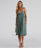 Palisades Ruched V-Neck Midi Dress creates the perfect spring wedding guest dress or cocktail attire with stylish details in the latest trends for 2023!