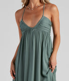 Palisades Ruched V-Neck Midi Dress creates the perfect spring wedding guest dress or cocktail attire with stylish details in the latest trends for 2023!