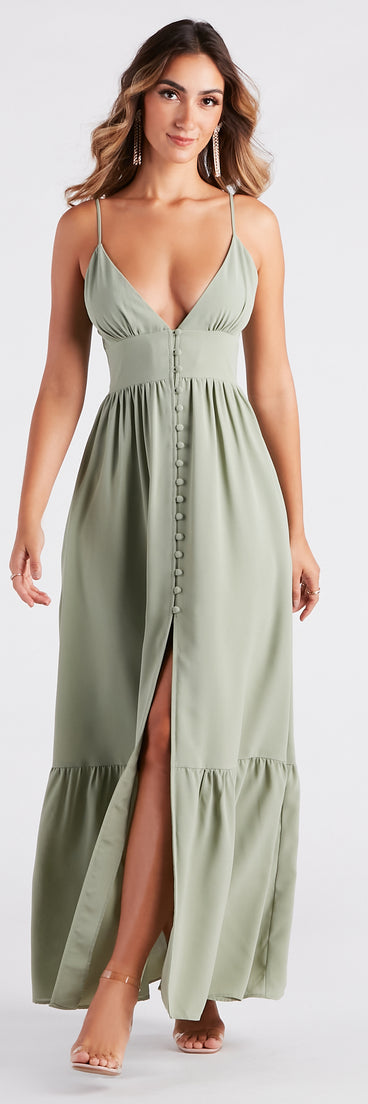 Essential for vacations or summer days, the Swept Off Your Feet Button Ruffle Maxi Dress is a sundress or milkmaid dress with sleek and flirty details.