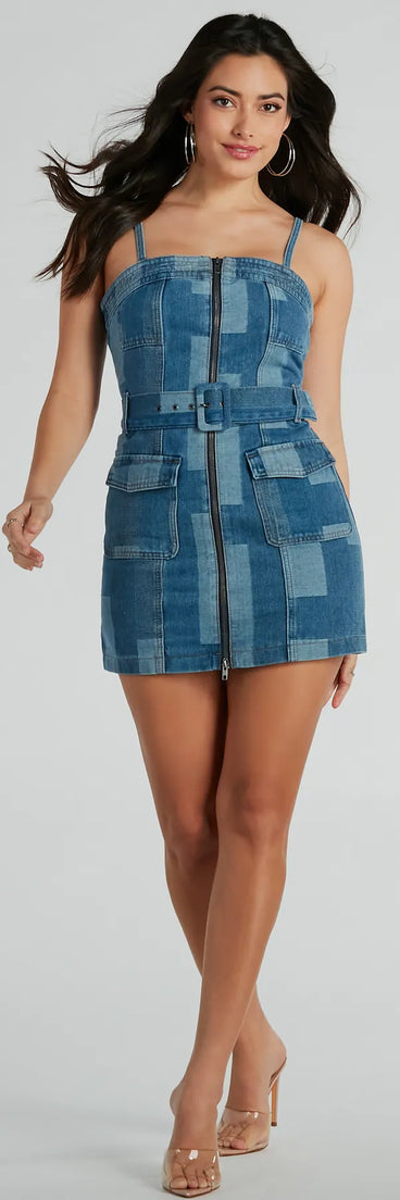 Essential for vacations or summer days, the Patchwork It Belted Denim Mini Dress is a sundress or milkmaid dress with sleek and flirty details.