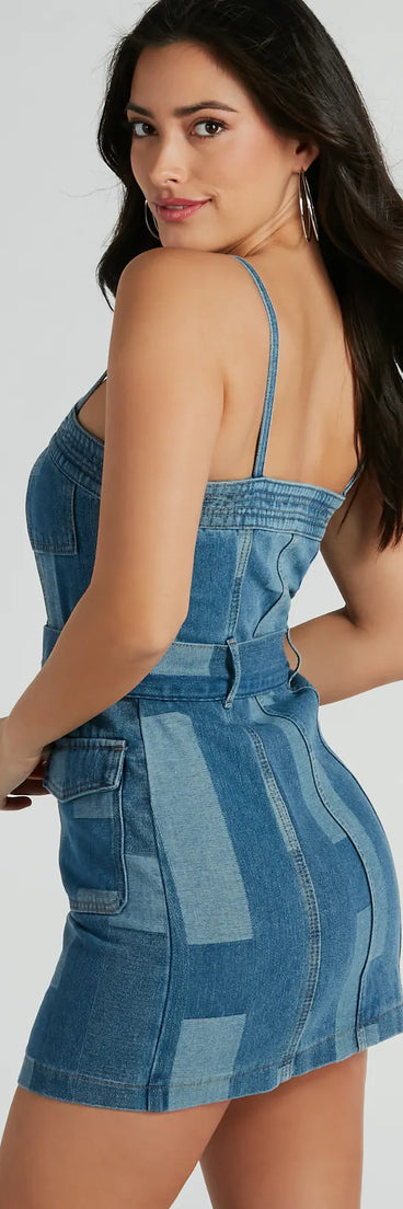 Essential for vacations or summer days, the Patchwork It Belted Denim Mini Dress is a sundress or milkmaid dress with sleek and flirty details.
