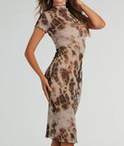 The Make It Fierce Crew Neck Leopard Mesh Midi Dress is a casual dress for more than special occasions with a fitted or flowy silhouette and accents in the most recent trends!