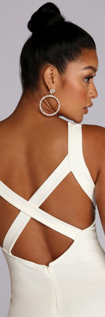You’ll make a statement in Cross Purposes Open Back Dress as an NYE club dress, a tight dress for holiday parties, sexy clubwear, or a sultry bodycon dress for that fitted silhouette.