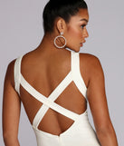You’ll make a statement in Cross Purposes Open Back Dress as an NYE club dress, a tight dress for holiday parties, sexy clubwear, or a sultry bodycon dress for that fitted silhouette.