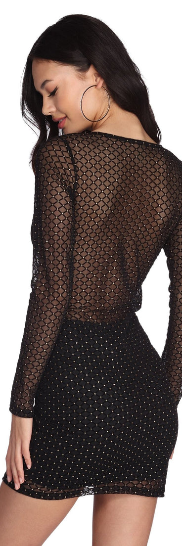 You’ll make a statement in A Complete Mesh Mini Dress as an NYE club dress, a tight dress for holiday parties, sexy clubwear, or a sultry bodycon dress for that fitted silhouette.