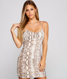 You’ll make a statement in Stunning Style Snake Print Mini Dress as an NYE club dress, a tight dress for holiday parties, sexy clubwear, or a sultry bodycon dress for that fitted silhouette.