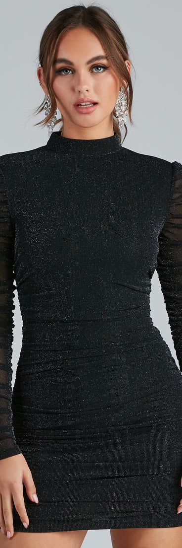 You’ll make a statement in Shine Queen Mock Neck Ruched Dress as an NYE club dress, a tight dress for holiday parties, sexy clubwear, or a sultry bodycon dress for that fitted silhouette.