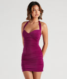 The Total Knockout Halter Mini Dress is a unique party dress to help you create a look for work parties, birthdays, anniversaries, or your next 2023 celebration!