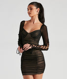 The Mesh Attention Lace Up Mini Dress is a unique party dress to help you create a look for work parties, birthdays, anniversaries, or your next 2023 celebration!