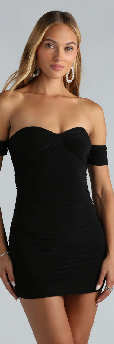 Wine And Dine Off The Shoulder Mini Dress creates the perfect spring or summer wedding guest dress or cocktail attire with chic styles in the latest trends for 2024!