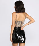 With fun and flirty details, Snake It Til You Make It Bodysuit shows off your unique style for a trendy outfit for the summer season!