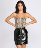 With fun and flirty details, Snake It Til You Make It Bodysuit shows off your unique style for a trendy outfit for the summer season!