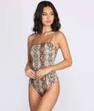 With fun and flirty details, Snake It Til You Make It Bodysuit shows off your unique style for a trendy outfit for the summer season!