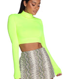With fun and flirty details, Trendy Turtle Neck Crop Top shows off your unique style for a trendy outfit for the summer season!