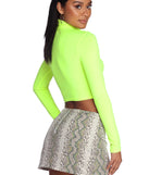 With fun and flirty details, Trendy Turtle Neck Crop Top shows off your unique style for a trendy outfit for the summer season!
