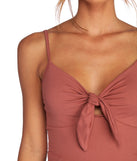 With fun and flirty details, Knot A Basic Crop Top shows off your unique style for a trendy outfit for the summer season!