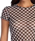 With fun and flirty details, Check On It Mesh Top shows off your unique style for a trendy outfit for the summer season!