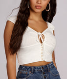 With fun and flirty details, New Rules Button Crop Top shows off your unique style for a trendy outfit for the summer season!