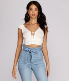 With fun and flirty details, New Rules Button Crop Top shows off your unique style for a trendy outfit for the summer season!