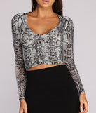 With fun and flirty details, Snake Print Mama Ruched Crop Top shows off your unique style for a trendy outfit for the summer season!