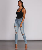 With fun and flirty details, Buckle Down Sleeveless Bodysuit shows off your unique style for a trendy outfit for the summer season!