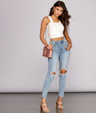 With fun and flirty details, Slim Rib Cross Back Top shows off your unique style for a trendy outfit for the summer season!