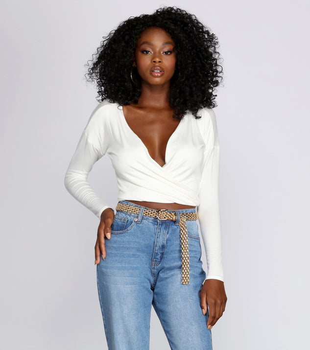 With fun and flirty details, Streamlined Surplice Wrap Top shows off your unique style for a trendy outfit for the summer season!