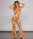 With fun and flirty details, To Paradise Printed Crop Top shows off your unique style for a trendy outfit for the summer season!