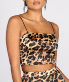 With fun and flirty details, Cropped Leopard Print Satin Top shows off your unique style for a trendy outfit for the summer season!