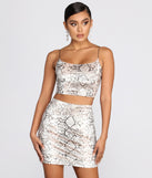 You’ll look stunning in the Luxe Velvet Snake Print Crop Top when paired with its matching separate to create a glam clothing set perfect for a New Year’s Eve Party Outfit or Holiday Outfit for any event!