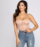 Dress up in World Class Sweetheart Lace Rhinestone Bodysuit as your going-out dress for holiday parties, an outfit for NYE, party dress for a girls’ night out, or a going-out outfit for any seasonal event!