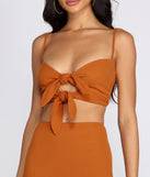 You’ll look stunning in the Stylish Standard Tie Front Cami when paired with its matching separate to create a glam clothing set perfect for parties, date nights, concert outfits, back-to-school attire, or for any summer event!